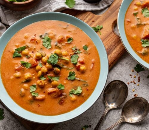 chickpea masala tomato soup with chili, coconut milk, and curry spices for vegan soup recipes