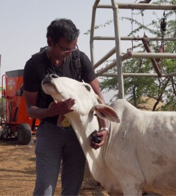 Photo shows Harsha Atmakuri, a doctor-turned-animal rights activist and the writer, producer, and director of 'Maa Ka Doodh,' the documentary that tackles India's dairy industry