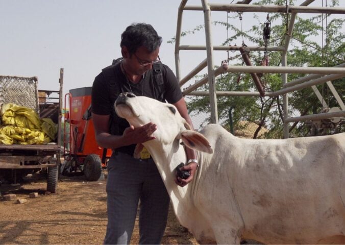 Photo shows Harsha Atmakuri, a doctor-turned-animal rights activist and the writer, producer, and director of 'Maa Ka Doodh,' the documentary that tackles India's dairy industry