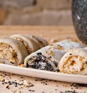 vegan fried mochi rolls with peanuts, walnuts, oats, and white and black sesame seeds