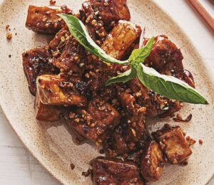 garlic and pepper tofu stir fry with Thai flavors for high-protein and gluten-free vegan recipes