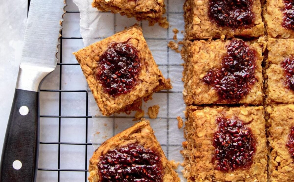 baked peanut butter and jam oat bars with your favorite jam