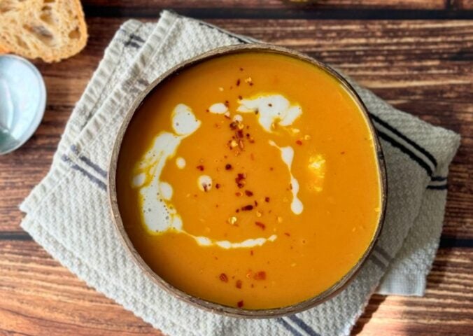 pumpkin soup with carrot, onion, garlic, coconut milk, and lemon