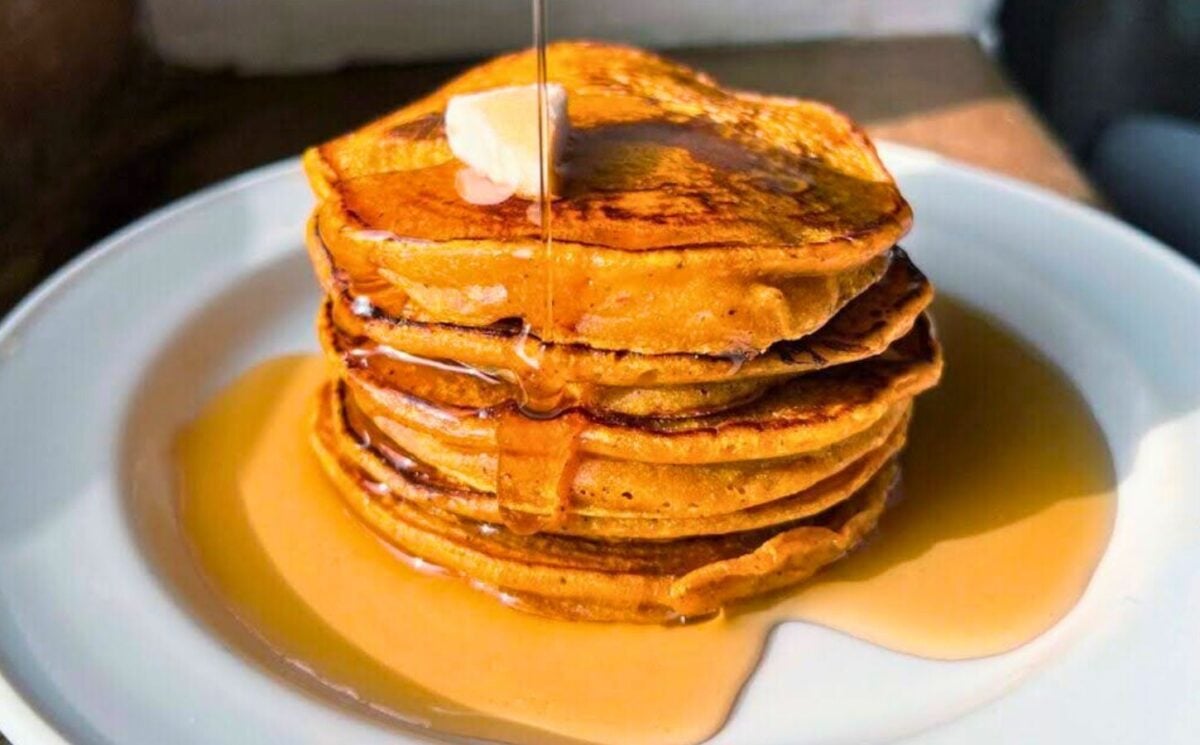 pumpkin spiced latte pancakes with ground coffee and maple syrup
