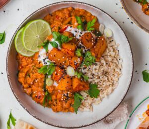 a bowl of creamy roasted butternut squash and spinach dhal for wholesome orange veggie recipes
