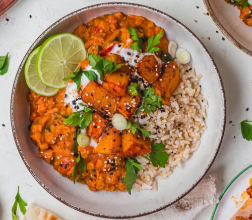 a bowl of creamy roasted butternut squash and spinach dhal for wholesome orange veggie recipes