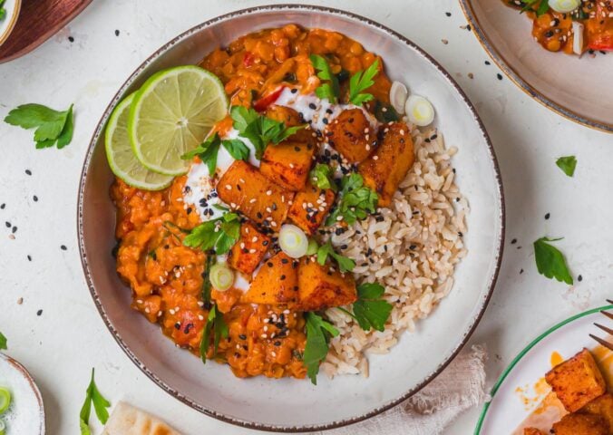 a bowl of creamy roasted butternut squash and spinach dhal for wholesome orange veggie recipes