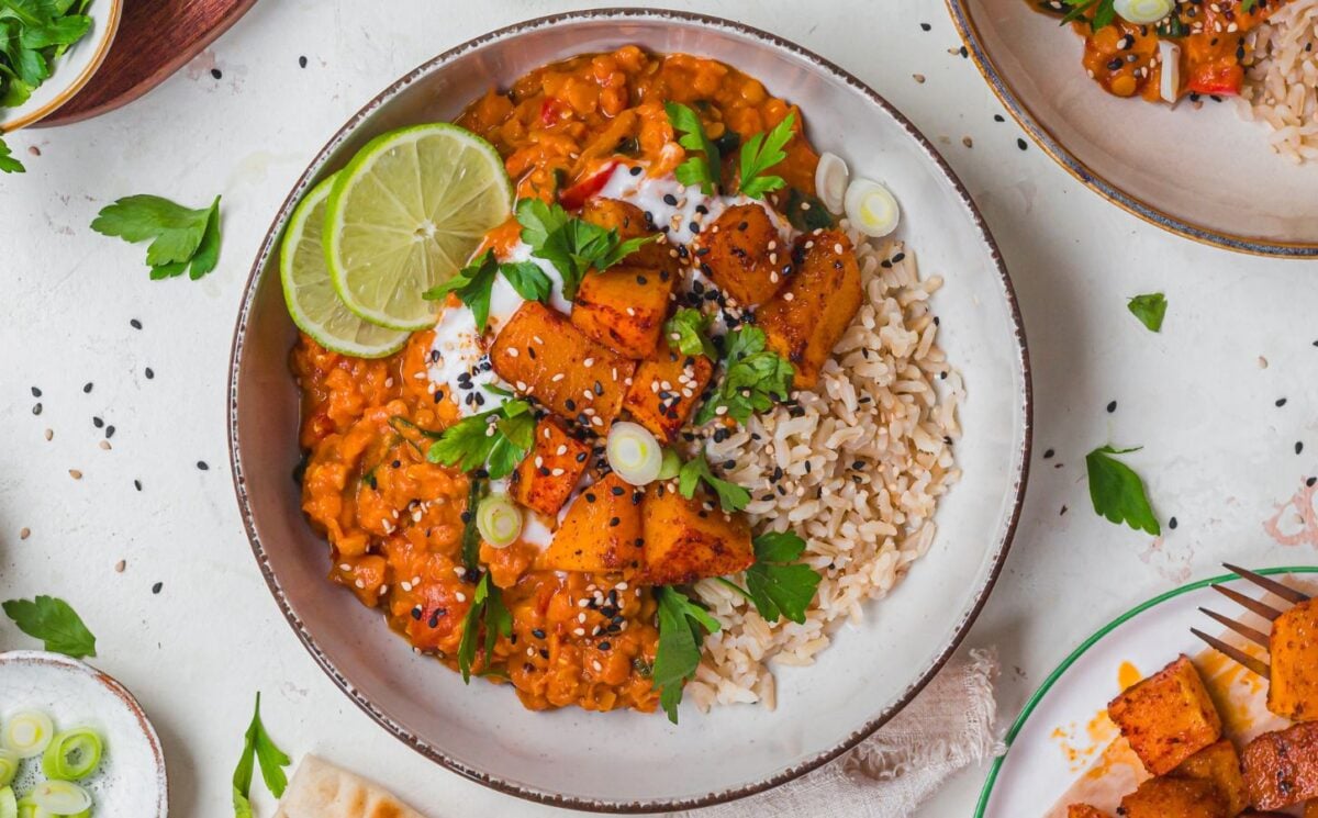 a bowl of creamy roasted butternut squash and spinach dhal for high-protein fall recipes