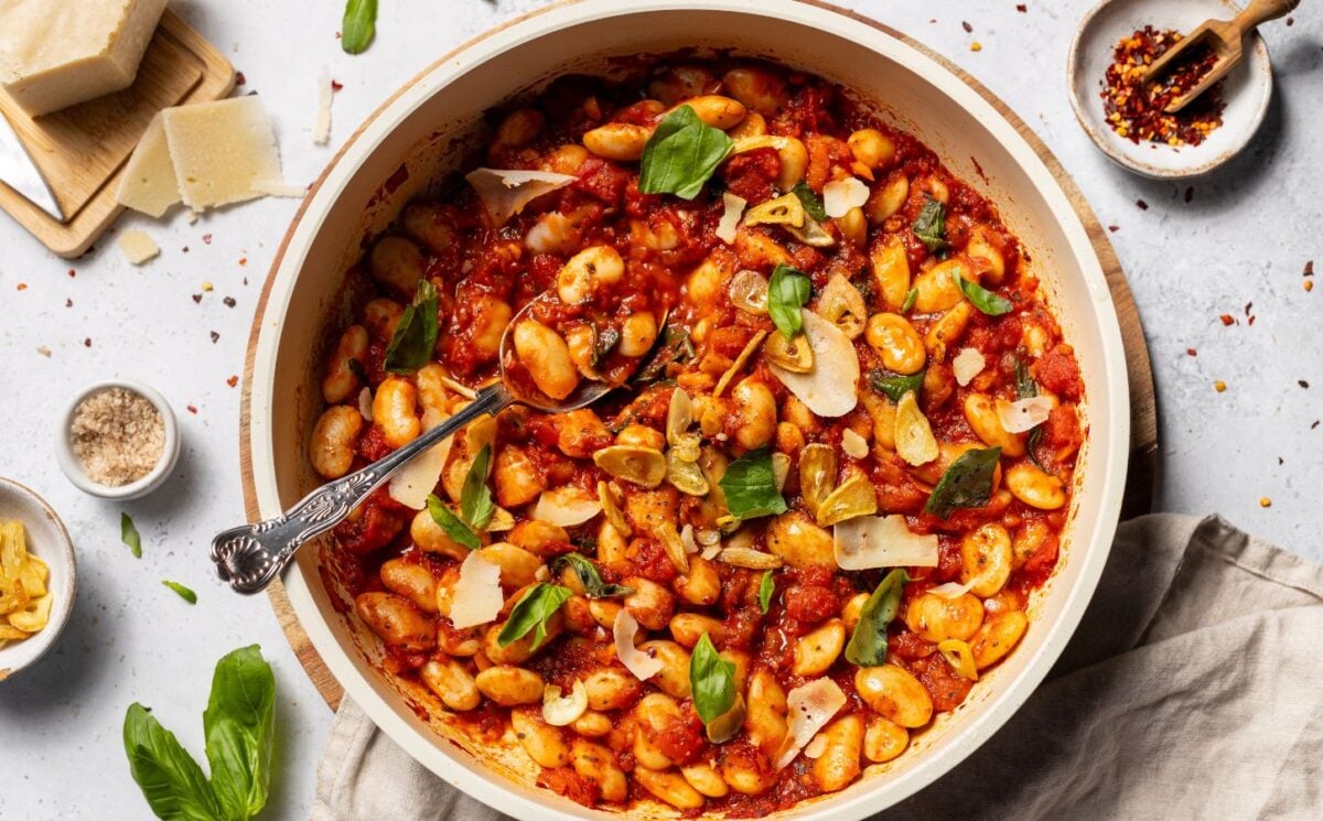 a bowl of spicy arrabbiata butter beans for high-protein vegan recipes whole foods