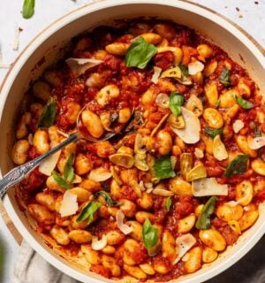 a bowl of spicy arrabbiata butter beans for high-protein vegan recipes whole foods
