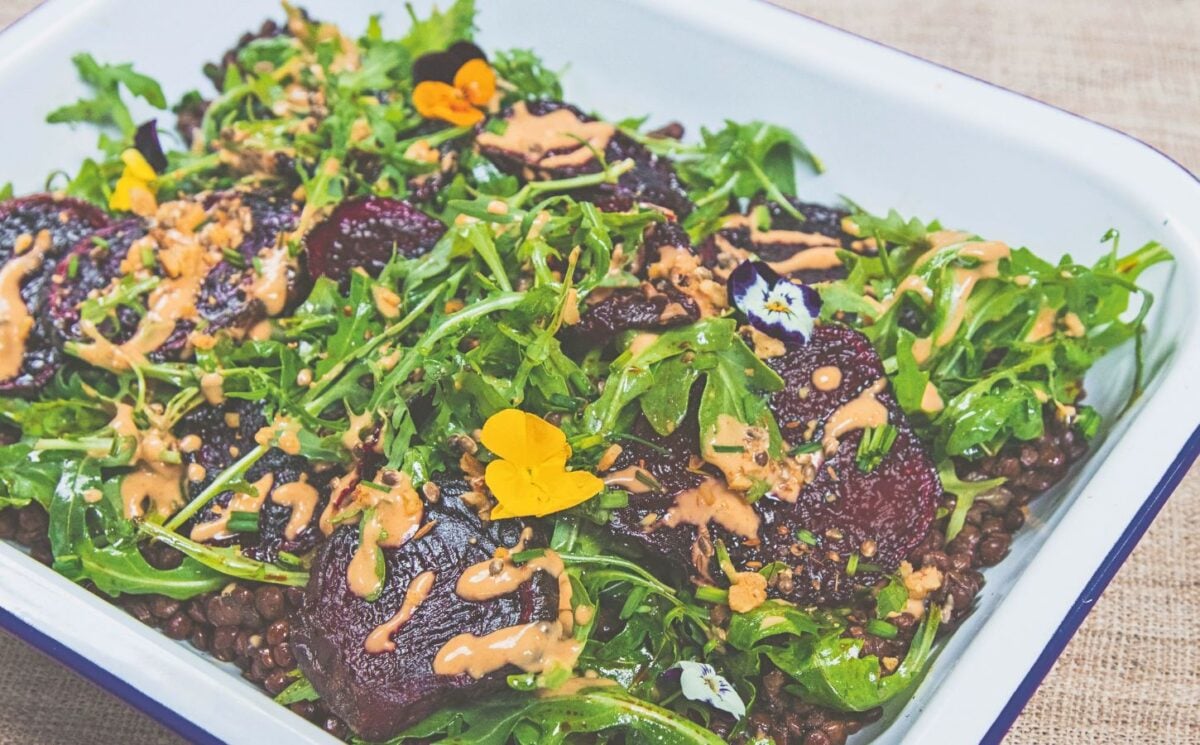 spicy lentils and beetroot salad with peanut dressing and rocket