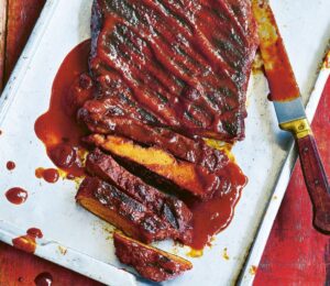 sweet cranberry glazed BBQ ribs with seitan ribs, a cranberry and orange sauce, and allspice