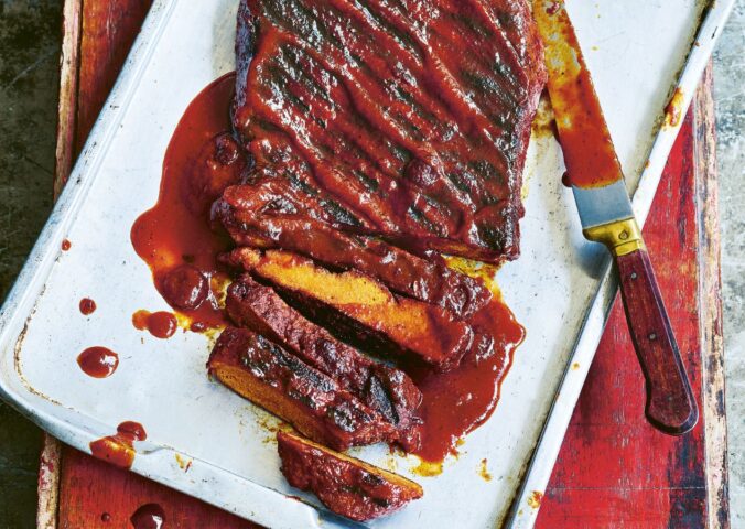sweet cranberry glazed BBQ ribs with seitan ribs, a cranberry and orange sauce, and allspice