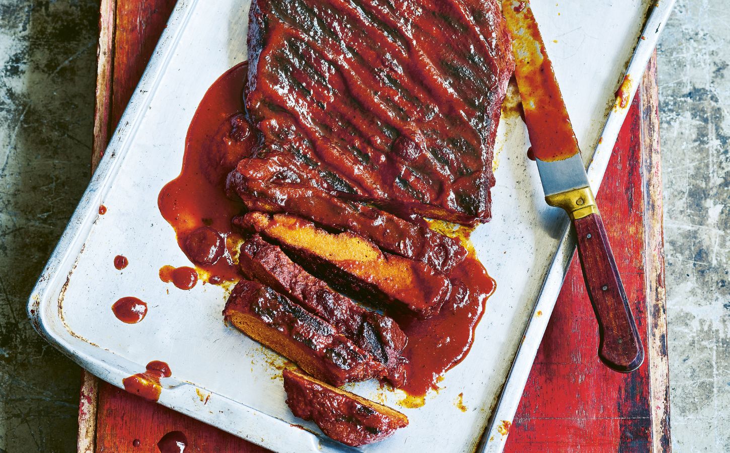 sweet cranberry glazed BBQ ribs with seitan ribs, a cranberry and orange sauce, and allspice