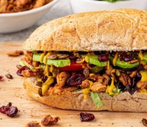 A vegan club sandwich with "turkey" flavor soy curls for cozy sandwich recipes