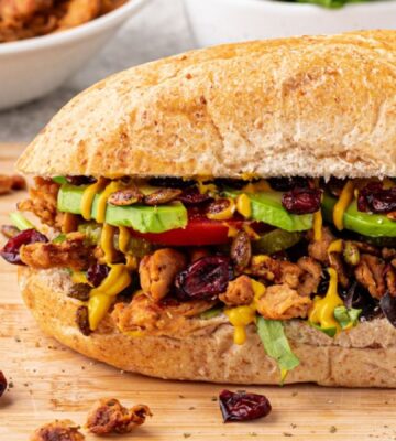 A vegan club sandwich with "turkey" flavor soy curls for cozy sandwich recipes
