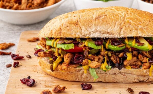 A vegan club sandwich with "turkey" flavor soy curls for cozy sandwich recipes