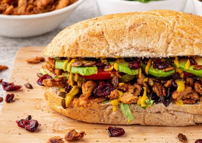 A vegan club sandwich with "turkey" flavor soy curls for cozy sandwich recipes