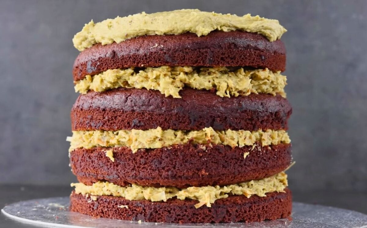 a freshly baked vegan Dubai chocolate cake with four layers