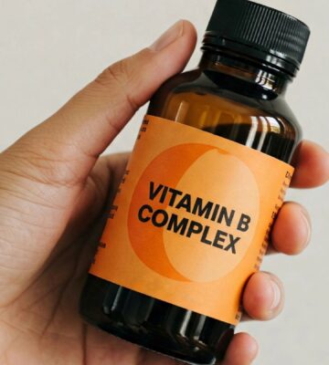 a bottle of vitamin B capsules for the article that helps you choose the best b12 supplement