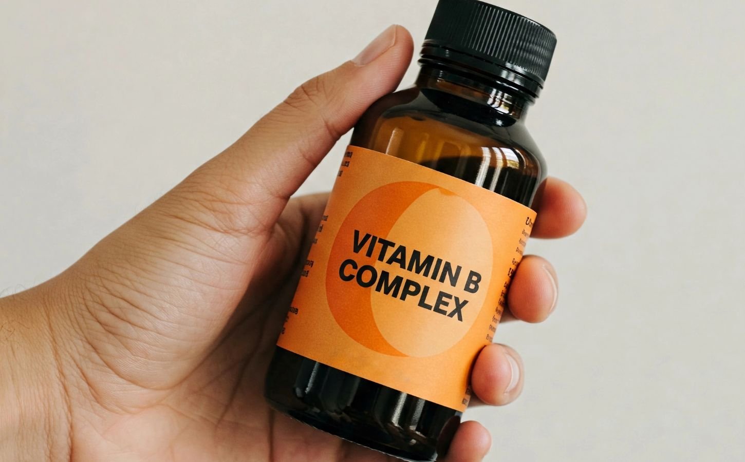 a bottle of vitamin B capsules for the article that helps you choose the best b12 supplement