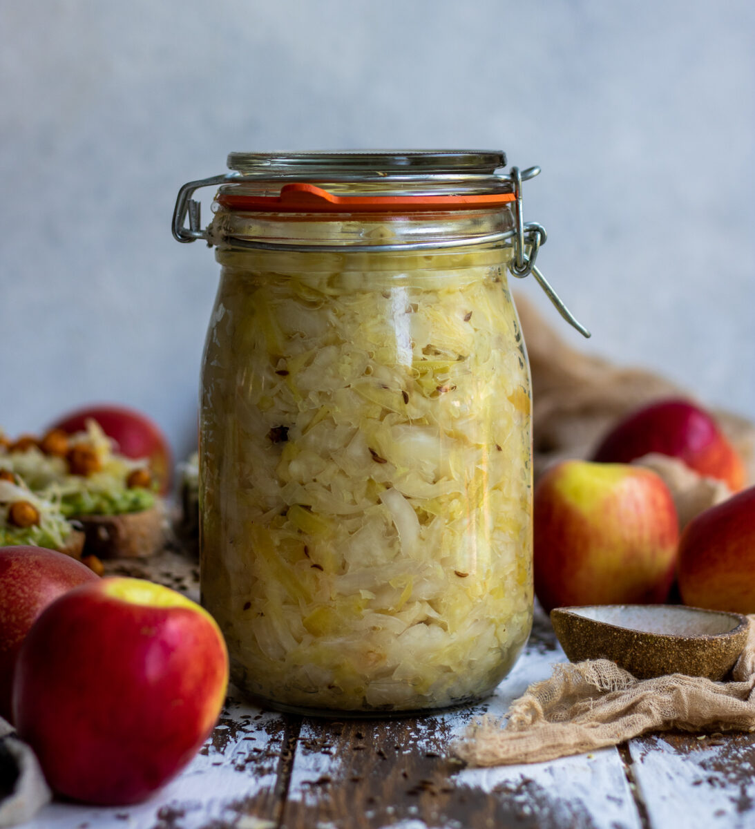 apple spiced sauerkraut with ginger, juniper berry, and caraway seeds
