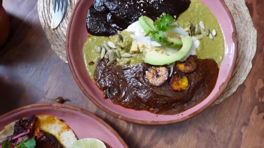 Overhead shot of a plate of three varieties of mole and one of tacos, while Rose Lee explored Mexico City's plant-based scene