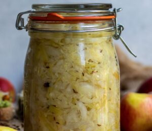 apple spiced sauerkraut with ginger, juniper berry, and caraway seeds