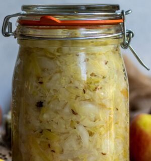 apple spiced sauerkraut with ginger, juniper berry, and caraway seeds