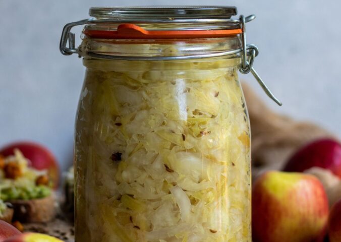 apple spiced sauerkraut with ginger, juniper berry, and caraway seeds