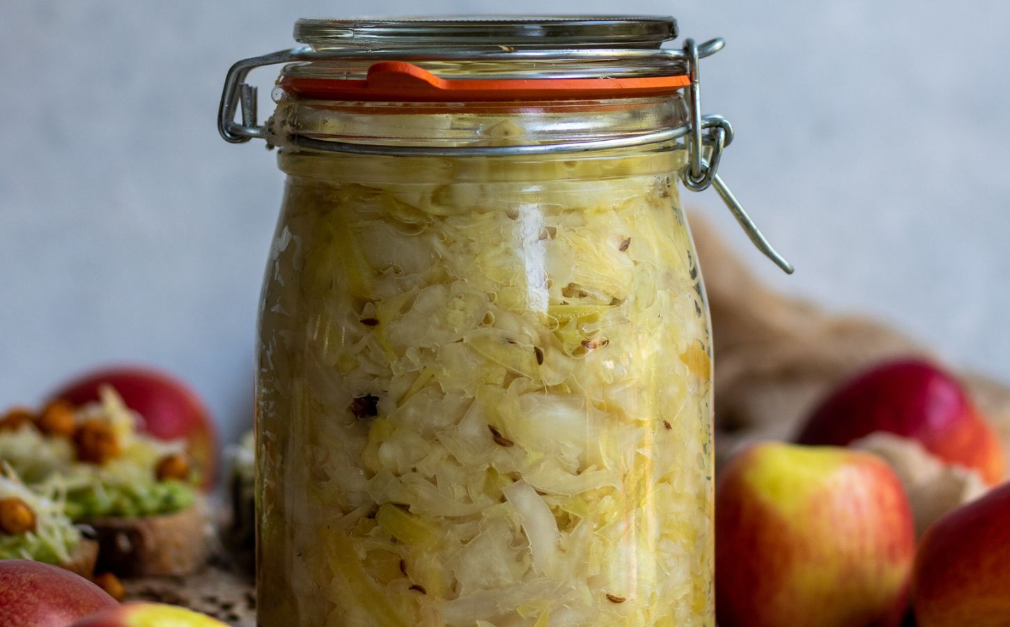 apple spiced sauerkraut with ginger, juniper berry, and caraway seeds
