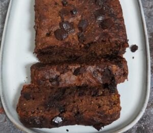 a chocolate butternut cake with butternut squash, vegan chocolate chips, and chia seeds