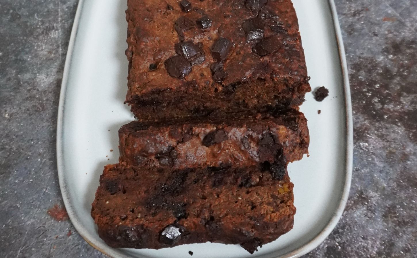 a chocolate butternut cake with butternut squash, vegan chocolate chips, and chia seeds