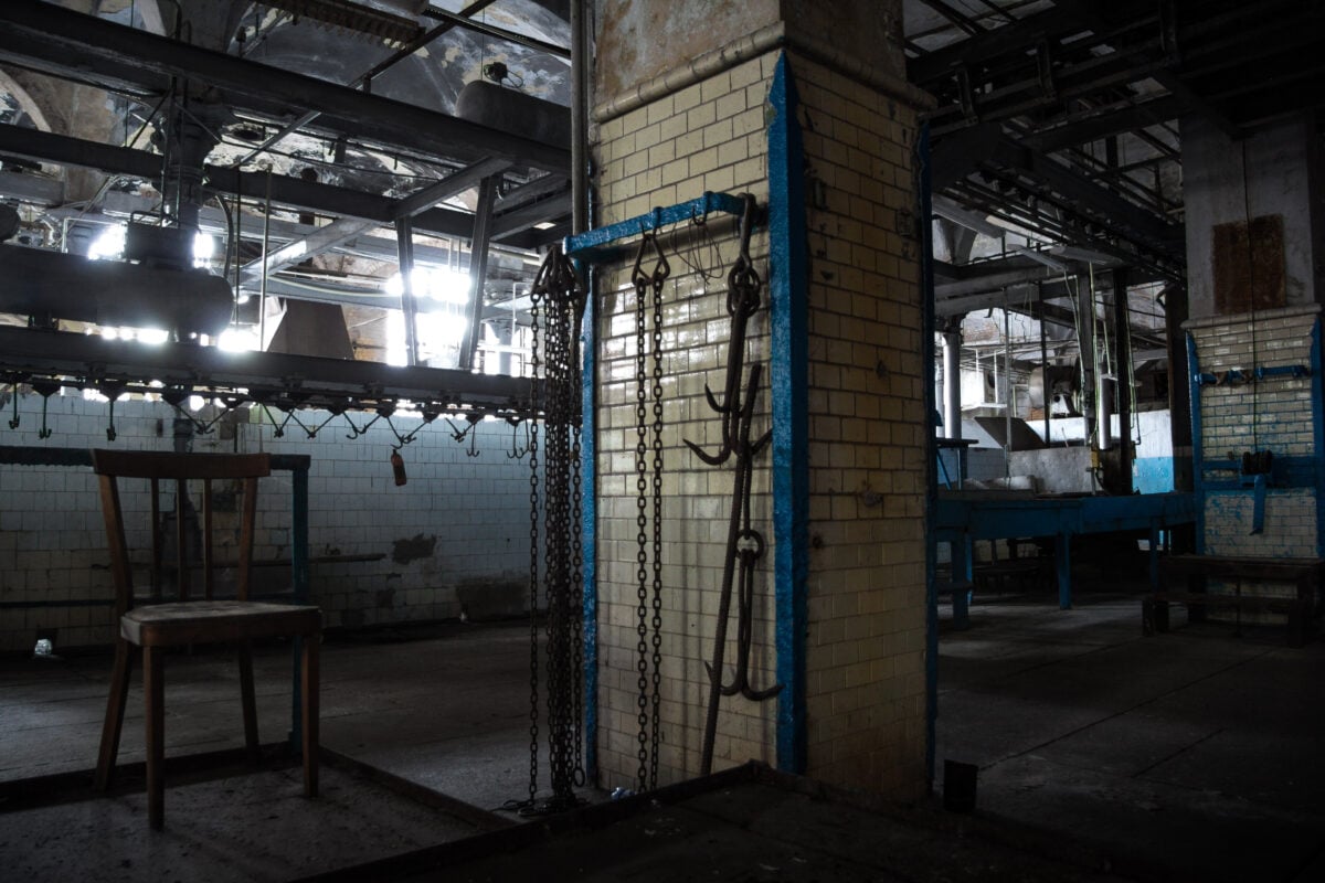 Photo shows an abandoned slaughterhouse/meat-packing plant