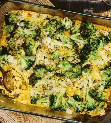a picture of a vegan cheesy broccoli bake made with silken tofu, nutritional yeast, paprika, and tahini for easy casserole recipes