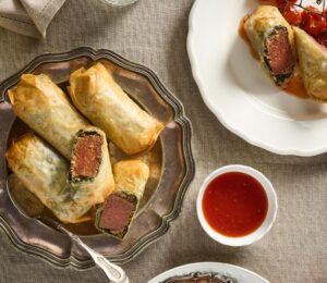 mini flank steak wellingtons with tomato and chili chutney