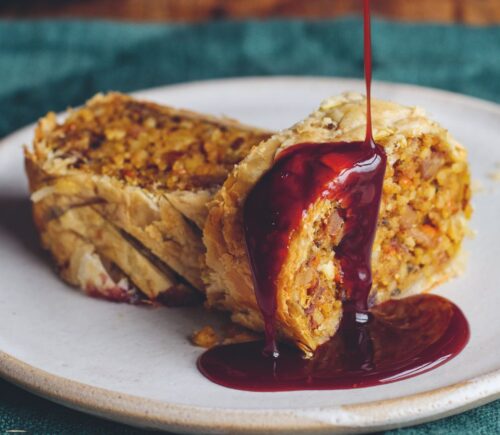 mushroom and pumpkin wellington with almonds and a redcurrant jus
