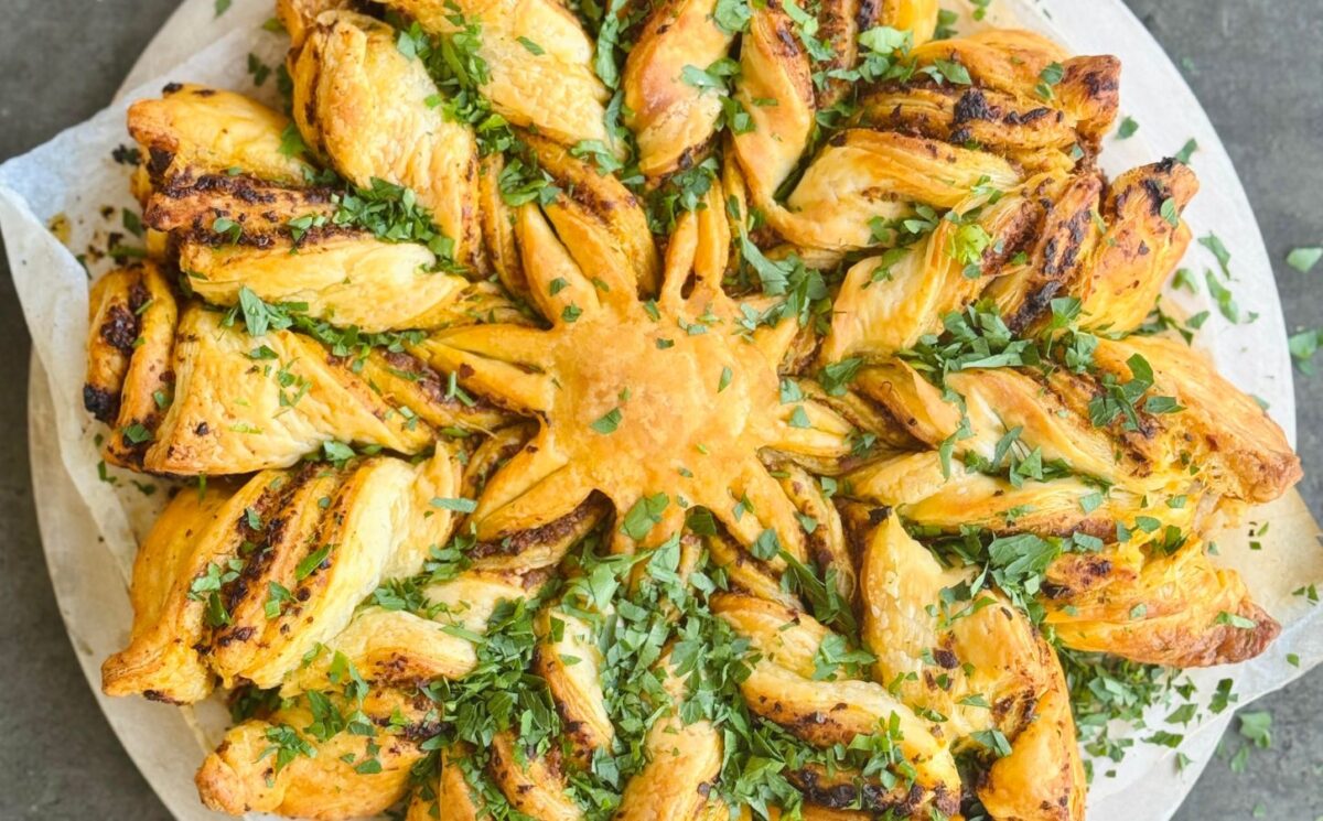 a pesto pastry star made with vegan puff pastry and your choice of pesto