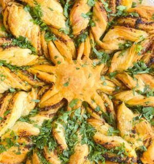 a pesto pastry star made with vegan puff pastry and your choice of pesto