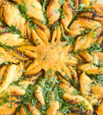 a pesto pastry star made with vegan puff pastry and your choice of pesto