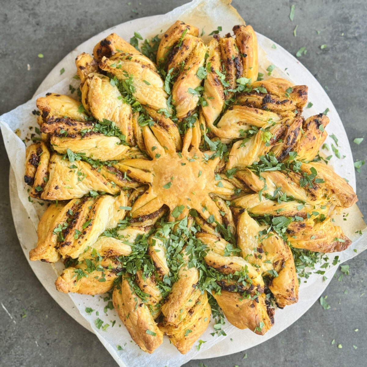 a pesto pastry star made with vegan puff pastry and your choice of pesto