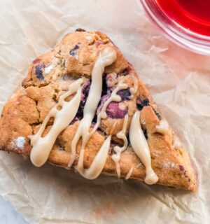 a picture of one of eight plant-based berry scones with lemon hibiscus cashew cream