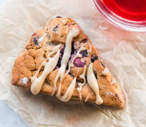 a picture of one of eight plant-based berry scones with lemon hibiscus cashew cream