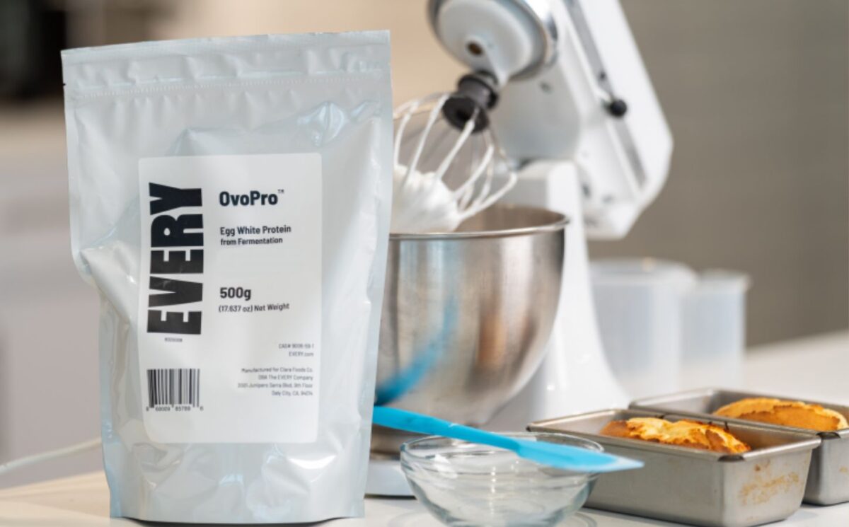 Photo shows a bag of The Every Company's powdered, precision fermented egg protein next to baking equipment and two small cakes