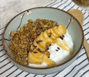 pumpkin granola with steamed pumpkin, peanut butter, walnuts, pumpkin seeds, and oats
