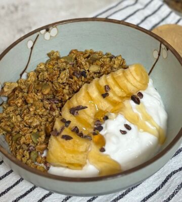 pumpkin granola with steamed pumpkin, peanut butter, walnuts, pumpkin seeds, and oats