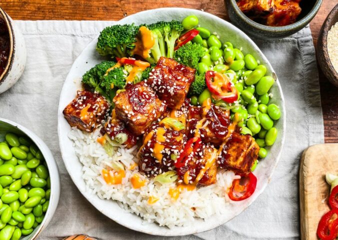 sticky gochujang tofu bowl with edamame, broccoli, and kimchi