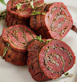stuffed flank steak with mushrooms and mulled wine shallots