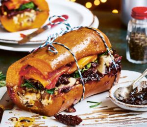 stuffed squash roast with butternut, glazed onions, Christmas rice, mushrooms and cranberry sauce