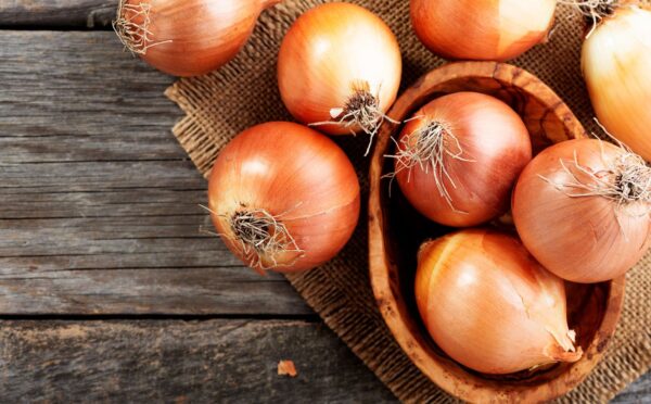 Shot of fresh onions, one of five everyday plant foods that reduce dementia risk